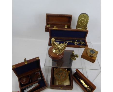 Six Nautical Items, including a brass telescope, letter opener, sundial compass, desk set (tape measure, stapler and clip), b