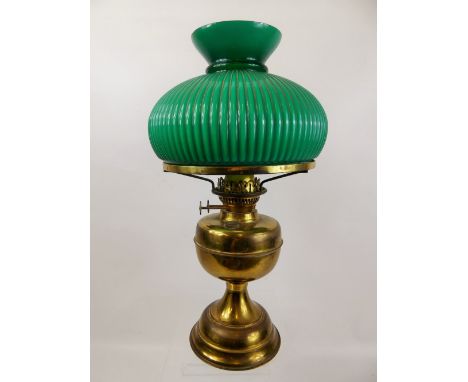 A Victorian Brass Oil Lamp, with green fluted shade, approx 50 cms.