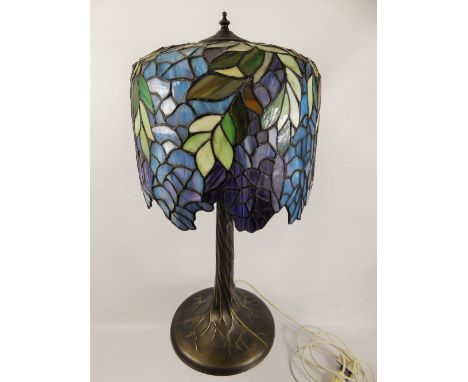 A Tiffany-Style Glass and Lead Table Lamp, depicting wisteria, approx 65 cms.