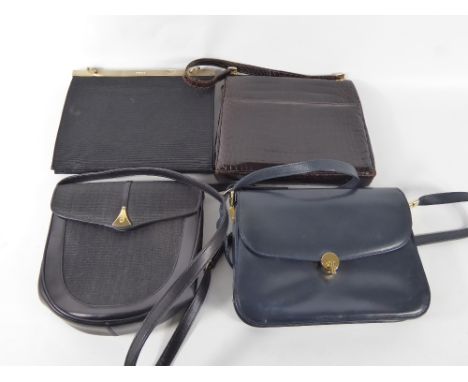 A Collection of Four Vintage Evening Bags, the first black silk taffeta with assayed silver gilt engine turned clasp, silk li