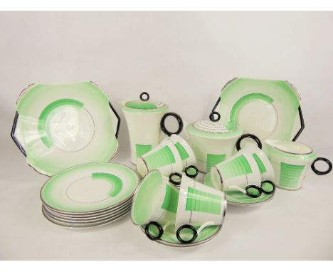 A Part Shelley Art Deco Tea and Coffee Service, pattern nr 12207 'Patches and Shades', including coffee pot and lid, teapot a