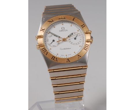 A gents Omega stainless steel and 18ct gold Constellation wristwatch, having signed white enamel dial, twin subsidiary day an