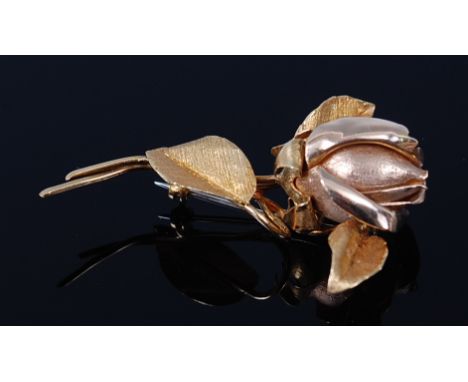 A modern 18ct gold brooch, modelled as a rosebud, having fine engine turned detail, 13.2g, 5.5cm