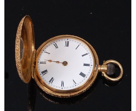A continental 18ct gold cased half hunter fob watch, the highly engraved case opening to reveal white enamel dial with Roman 