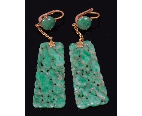 A pair of carved celadon jade and yellow metal ear pendants, as carved and pierced panels in the Chinese taste, on chain link