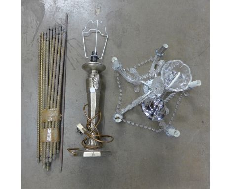 Assorted stair rods, a ceiling light and a table lamp 