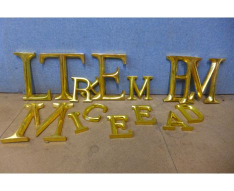 Assorted gilt letters, light fittings, etc. 