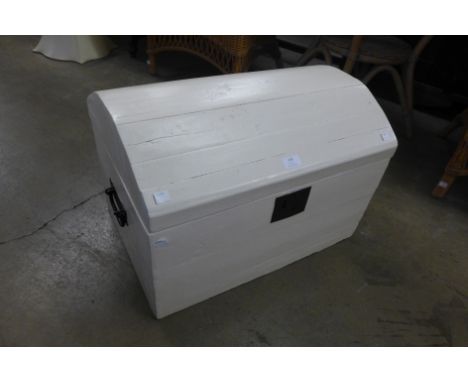 A small painted dome-top trunk 