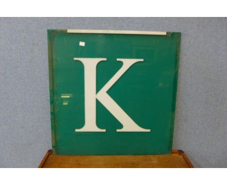 A Perspex 'K' sign 