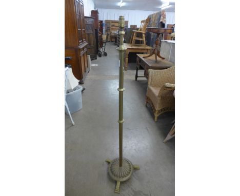 An early 20th Century brass floor standing lamp 