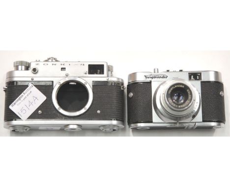 Vintage German Voigtlander film camera color skopar 1:3.5/50 and a Russian Zorki 4 film camera body. P&amp;P Group 2 (£18+VAT