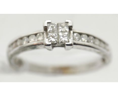 9ct white gold four diamond ring, size H, 1.7g, 0.33ct. P&amp;P Group 1 (£14+VAT for the first lot and £1+VAT for subsequent 