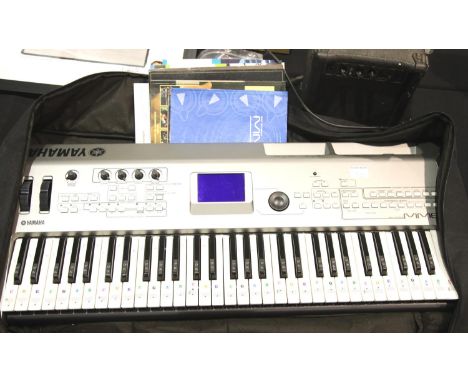 Yamaha MM6 work station synthiser with mixed music books case and leads and a Burswood G10 amplifier. This lot is not availab