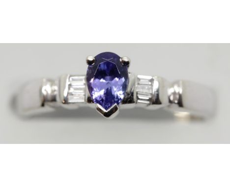 Ladies 18ct white gold, tanzanite and diamond fancy ring, RRP £700.00, size N, 3.9g. P&amp;P Group 1 (£14+VAT for the first l