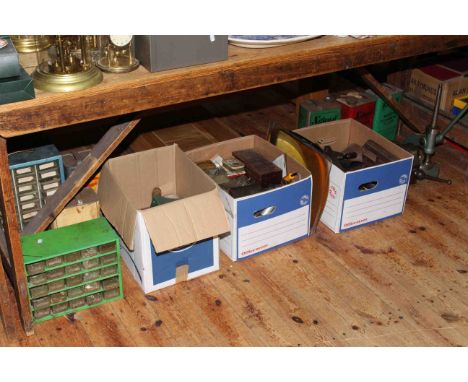Boxes of tools and watch/clock related parts, bench vice, old tins etc.