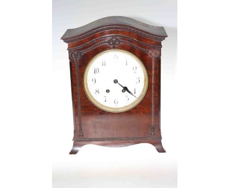 Mahogany arch topped bracket clock with enamel dial