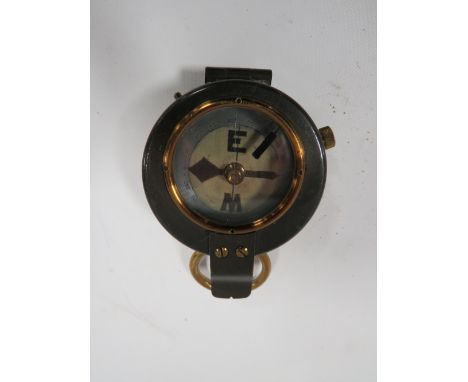 AN ANTIQUE MILITARY COMPASS