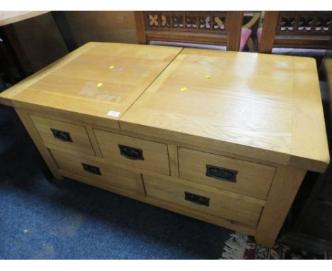 A LIGHT OAK COFFEE TABLE WITH SLIDING TOP &amp; DRAWERS A/F