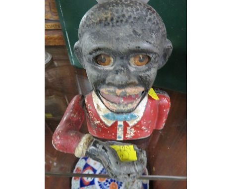 A NOVELTY METAL MONEY BOX Notice from the the-saleroom.com: These items are listed on the basis they are illustrative of a by