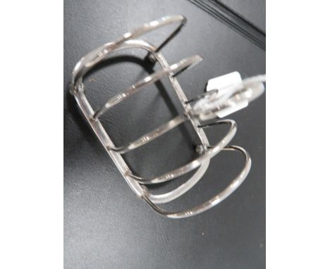 A SMALL SILVER TOAST RACK, SILVER FOB AND SILVER HANDLED BUTTON HOOK