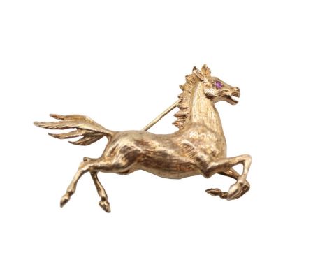 Good quality 9ct Gold Horse stylised Brooch with Ruby Set eye. 10.2g total weight