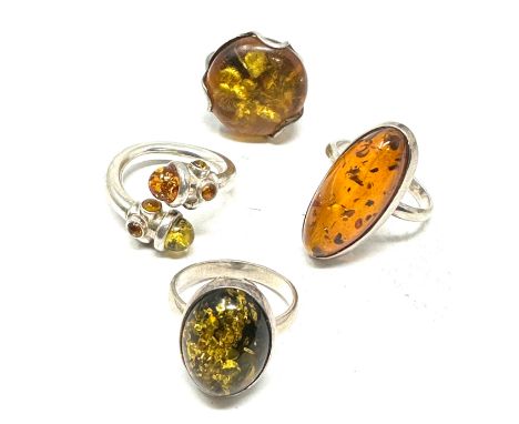 4 vintage silver &amp; amber rings 