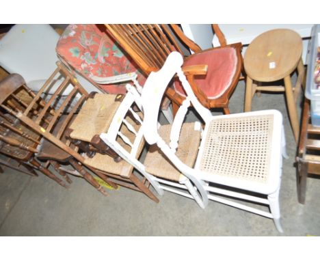 A string topped oak stool; a ladder back chair; a white painted string seated chair and a rope back chair 