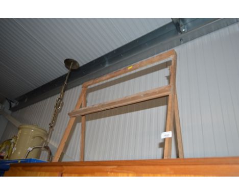 A folding artists easel 