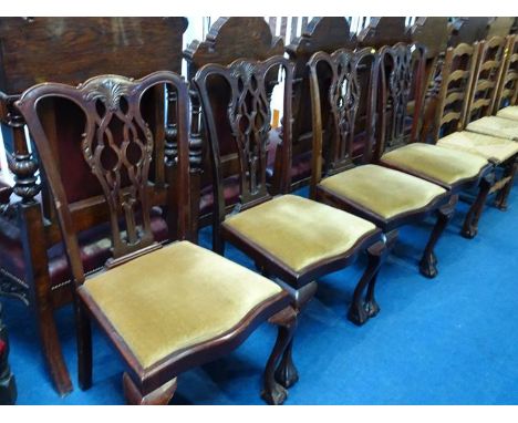 A set of four mahogany Chippendale style chairs, with claw and ball feet