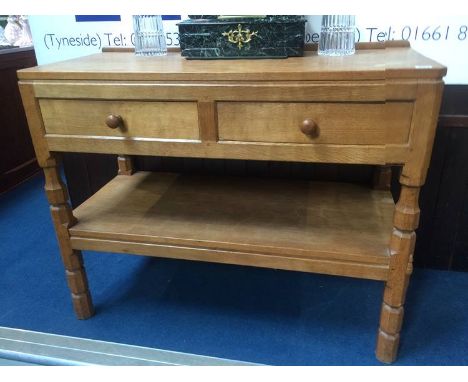 A Robert 'Mouseman' Thompson of Kilburn oak two drawer side table, 106.5cm wide, 50cm deep