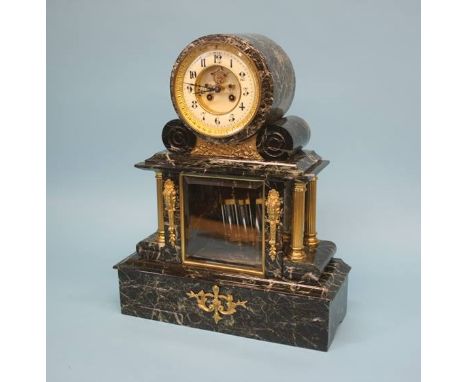 A large marble bracket clock, with circular dial, eight day movement, strike action and gilt metal mounts, 49cm high, 39cm wi