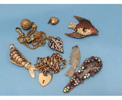 A yellow metal bracelet, a jade fish etc.
