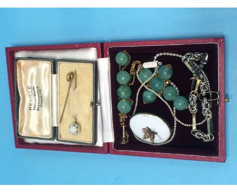 A Jade necklace, a seed pearl necklace, two pins etc. in a Harrods jewellery box