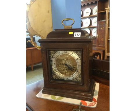A mahogany cased mantle clock