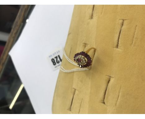 14CT YELLOW GOLD MARQUISE SHAPED RUBY AND DIAMOND CLUSTER RING