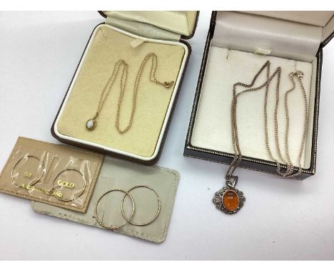 A Dainty 9ct Gold Single Stone Opal Pendant, on a fine chain; two pairs of sleeper style hoop earrings; an amber and marcasit