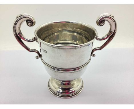 A Hallmarked Silver Twin Handled Trophy Cup, Wakely &amp; Wheeler, London 1916, stamped to base "Goldsmiths &amp; Silversmith