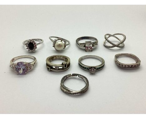 An Assortment of "925" and Other Rings, to include cluster style, Carrick Celtic design, stone set crossover, floral style pe