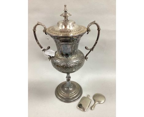 A Plated Twin Handled Lidded Trophy Cup, allover foliate decoration, with twin leaf capped scroll handles and pull off cover,