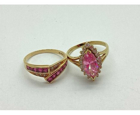 A Modern 9ct Gold Marquise Cluster Dress Ring, claw set throughout, between trifurcated shoulders (finger si\e O1/2); A Moder