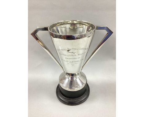 A Hallmarked Silver Twin Handled Trophy Cup, Birmingham 1935, of Art Deco style, tapering cylindrical form, engraved "Kingswo