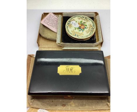 A Vintage Parco Paris Minaudieré, the black lacquered case, gilt lined with four lidded compartments, a miniature scent bottl