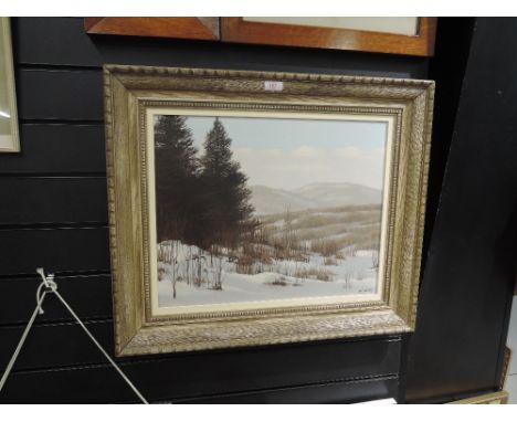 An original oil on board of pine forrest in snow by R Davies