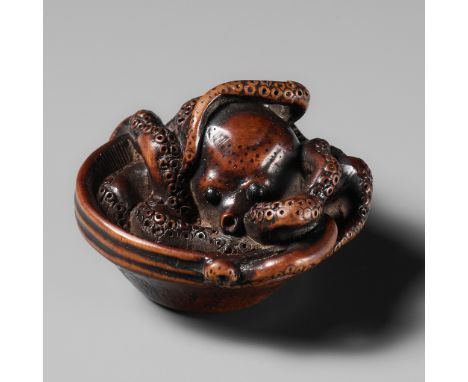MASATOMO: A SUPERB NAGOYA SCHOOL WOOD NETSUKE OF AN OCTOPUS IN SURIBACHIBy Masatomo, signed Masatomo ko 正友 工Japan, Nagoya, fi