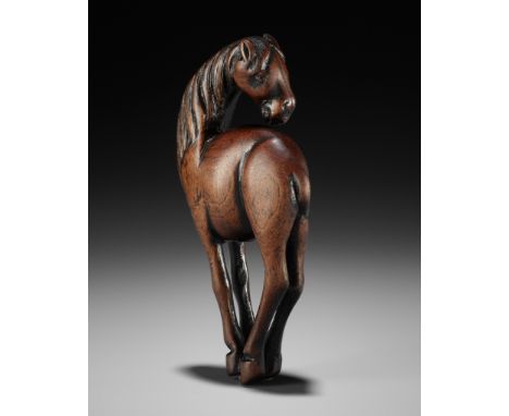 A SUPERB AND LARGE WOOD NETSUKE OF A HORSEUnsignedJapan, late 18th century, Edo period (1615-1868)Finely carved, the horse st