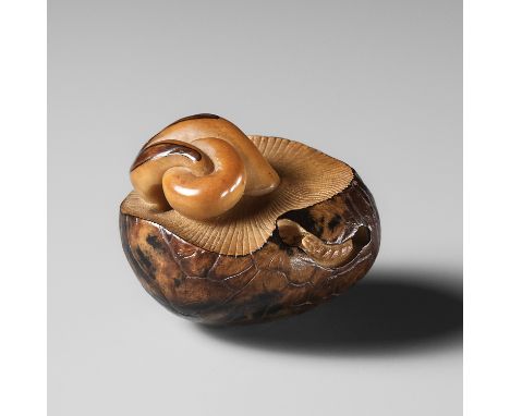 YOSHIMASA: A RARE COROZO NUT NETSUKE OF TWO MUSHROOMS AND A WORMBy Yoshimasa, signed Yoshimasa 義正Japan, second half of 19th c