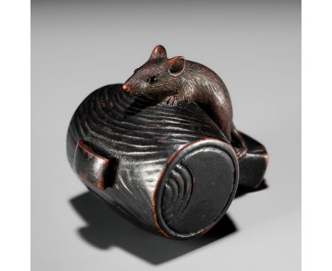 A WOOD NETSUKE OF A RAT ON DAIKOKU'S MALLETUnsignedJapan, Yamada, Ise province, 19th century, Edo period (1615-1868)Finely ca