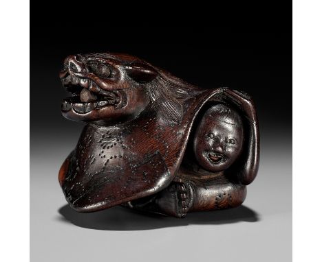 MIWA: A FINE WOOD NETSUKE OF A BOY AT SHISHIMAIBy Miwa, signed Miwa 三輪 with kakihanJapan, Edo (Tokyo), early 19th century, Ed