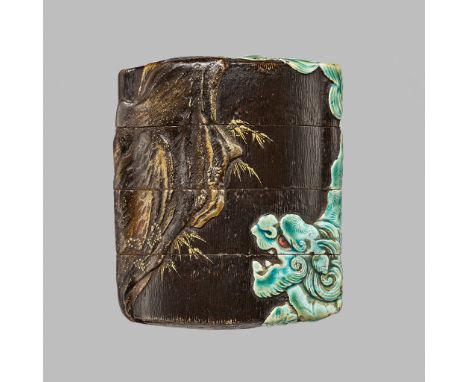 A SUPERB AND RARE CERAMIC-INLAID LACQUER THREE-CASE INRO DEPICTING A SHISHI, SIGNED KAJIKAWA AND SEALED KAN  The lacquer work