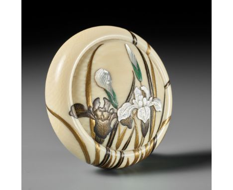 A FINE AND LARGE INLAID IVORY MANJU NETSUKE DEPICTING IRISES (SHOBU)UnsignedJapan, Tokyo, late 19th century, Meiji period (18